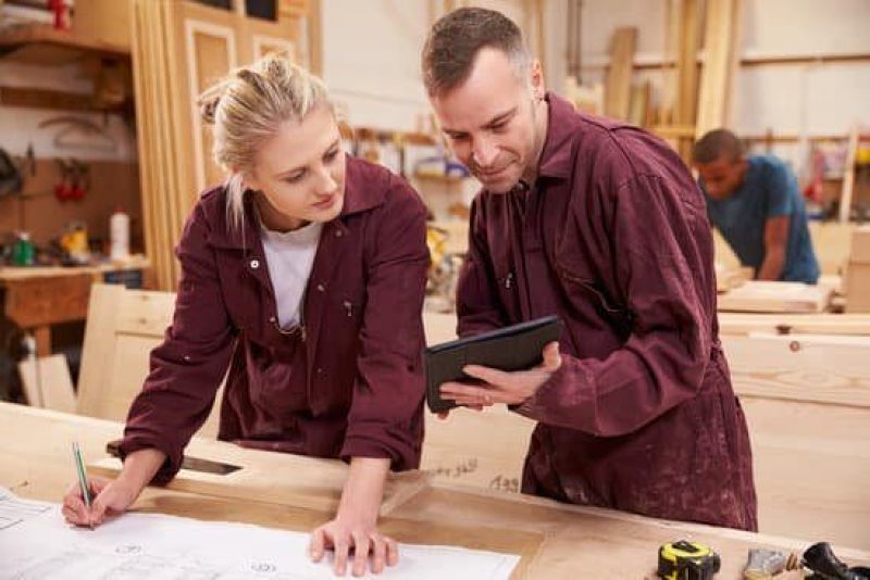 Carpentry Apprentice looking at plans